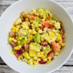 corn cooked with tomatoes and avocado 